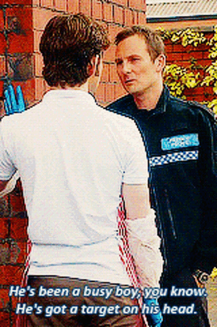 a man with a bandage on his arm is talking to a police officer who says he 's been a busy boy