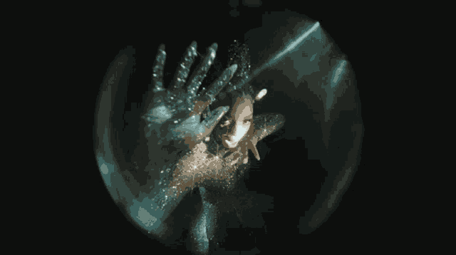 a woman in a white dress is surrounded by a glowing circle