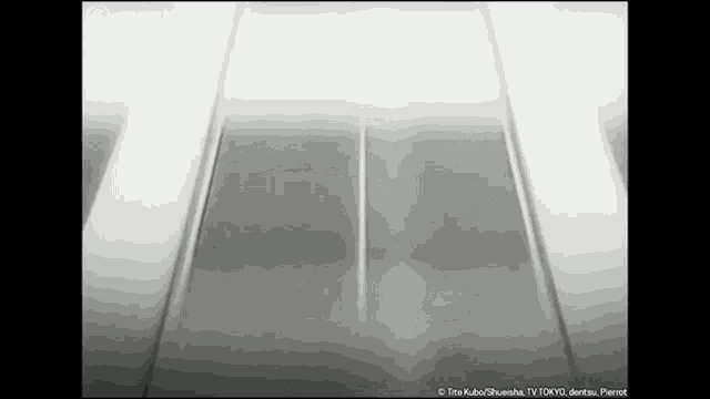 a black and white photo of a train track with a few lines on it .