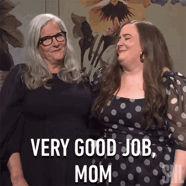 two women standing next to each other with the words " very good job mom "