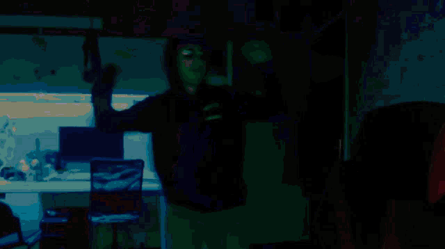 a blurry picture of a person dancing in a room