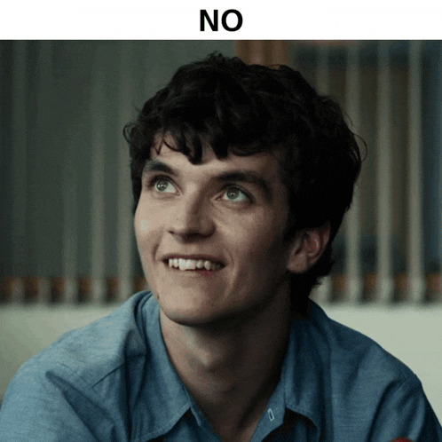 a close up of a man 's face with the words " no " above him