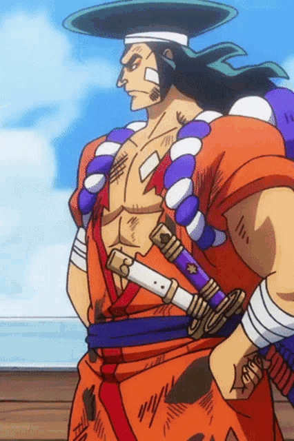 a man in a samurai outfit is holding a sword in his right hand
