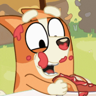 a cartoon dog is eating a hot dog with tomato sauce
