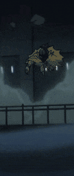 a large white object is floating in the air in the middle of a room .