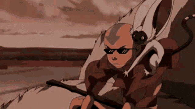 a man wearing sunglasses is holding a stick while a monkey is sitting on his back .