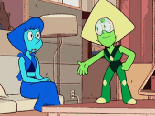 lapis lazuli and peridot are sitting on a couch talking to each other .
