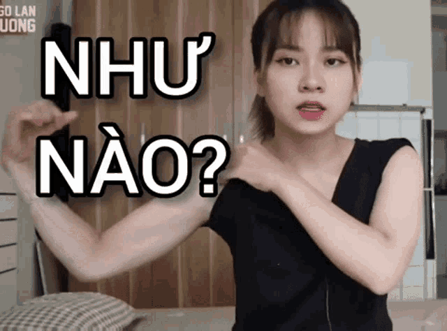 a woman flexes her muscles in front of the words nhu nao