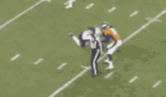 a blurred image of a football game with a referee wearing number 10