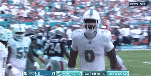 a football player wearing a number 0 jersey