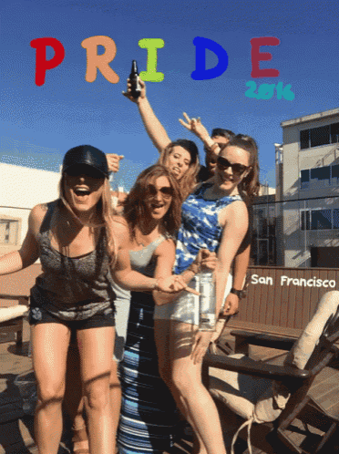a group of people are posing in front of a sign that says pride san francisco