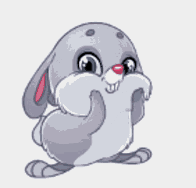 a cartoon rabbit is blowing a heart in the air .