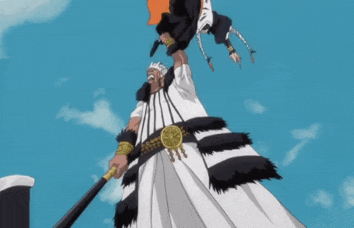 a man in a white and black striped dress holds a sword