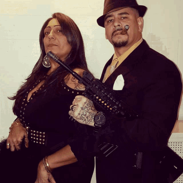 a man and a woman are posing for a picture and the man has a tattoo on his arm that says lucky