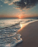 the sun is setting over the ocean and the waves are breaking on the beach