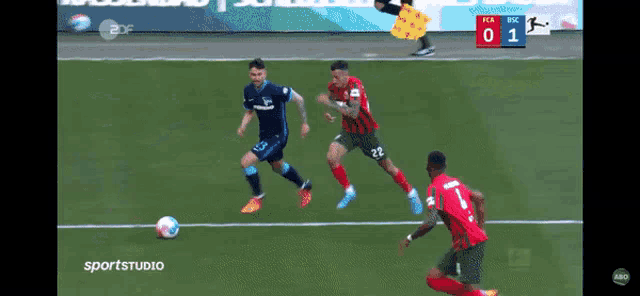 a soccer game is being shown on a sports studio channel