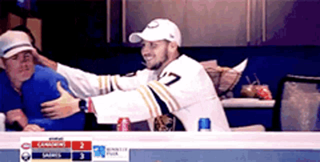 a man in a white jersey with the number 7 on it