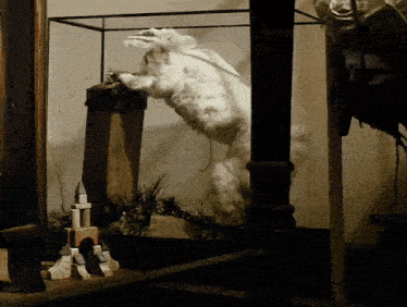 a statue of a rabbit in a glass display case