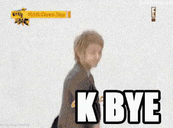 a man in a suit is waving his hand with the words k bye below him