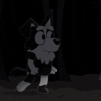 a black and white cartoon dog is standing in front of a tree .