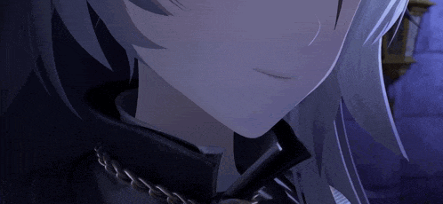 a close up of a person 's face with a necklace around their neck