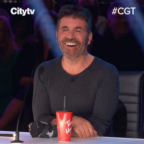 Laughing Simon Cowell GIF - Laughing Simon Cowell Canadas Got Talent GIFs