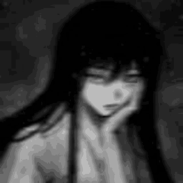 a black and white photo of a girl with long hair and a hand on her chin .