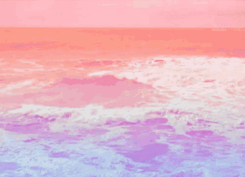 a picture of a pink and purple ocean taken by a person named kriss