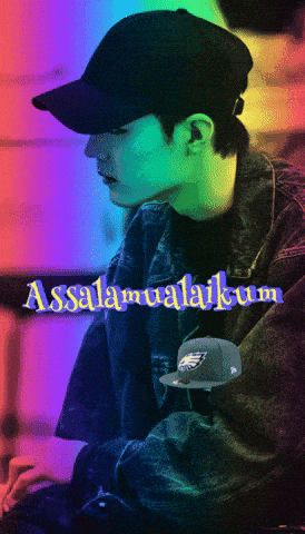 a picture of a man wearing a baseball cap with the words assalamualaikum on it