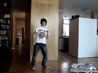 a man is dancing in a room with the words freegifmaker.me at the bottom of the image