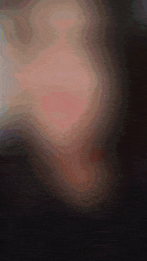 a close up of a person 's face with a swirl of colors