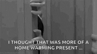 a black and white photo of a person with the words `` i thought that was more of a home warming present ... '' .