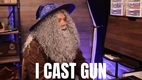 a man with a wizard hat and beard says i cast gun