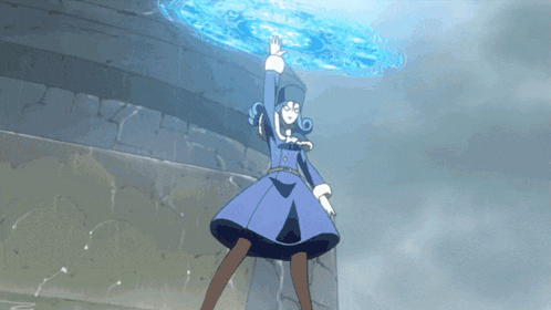 a woman in a blue dress is standing in front of a blue circle