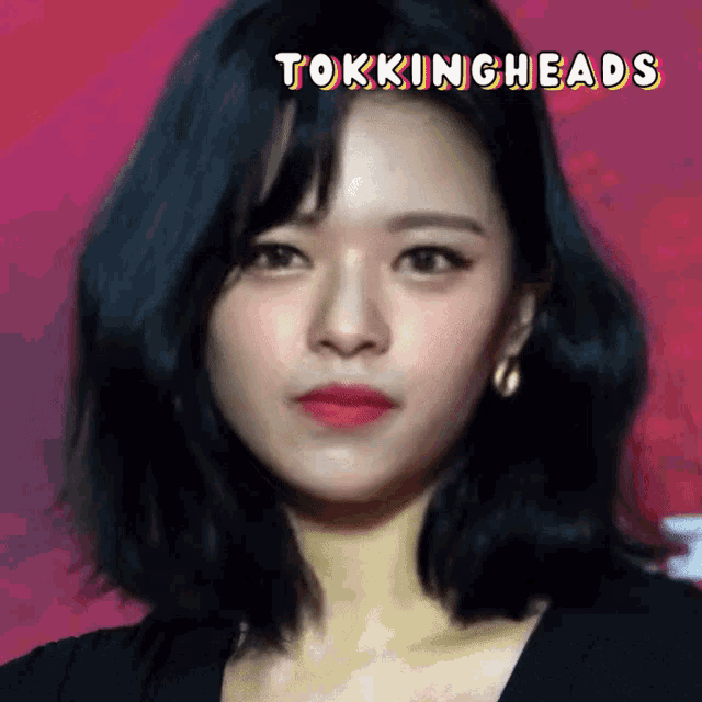 a close up of a woman 's face with the words " tokingheads " above her