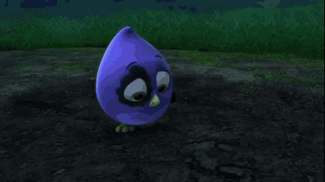 a purple bird is standing next to a plant