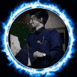 a man in a blue shirt is standing in a blue circle surrounded by fire .