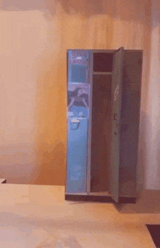 a blue locker with a sticker on it that says ' k '