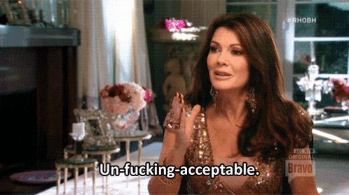 a woman says un-fucking-acceptable in front of a bravo logo