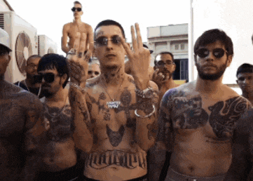a shirtless man with a tattoo on his chest that says ' i love you ' on it