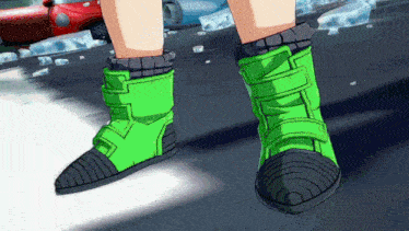 a close up of a person 's green boots
