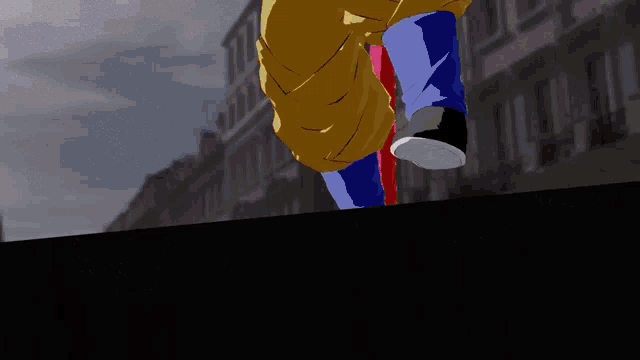 a person in a yellow jacket and blue and red pants is walking on a sidewalk