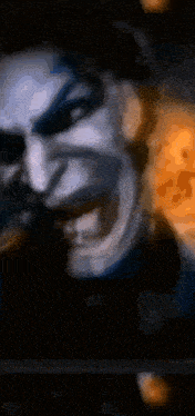 a close up of a person 's face with a very angry look on their face