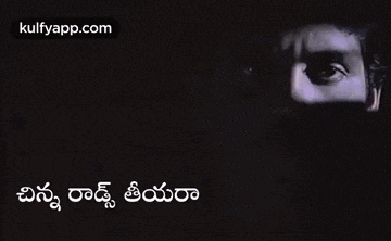 a close up of a man 's face with the words kulfyapp.com written below it