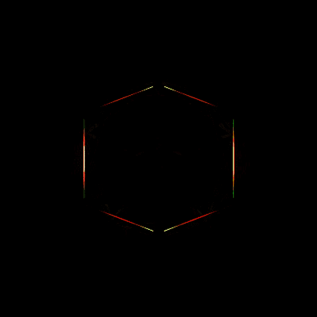 a cube made of red green and yellow lights on a black background