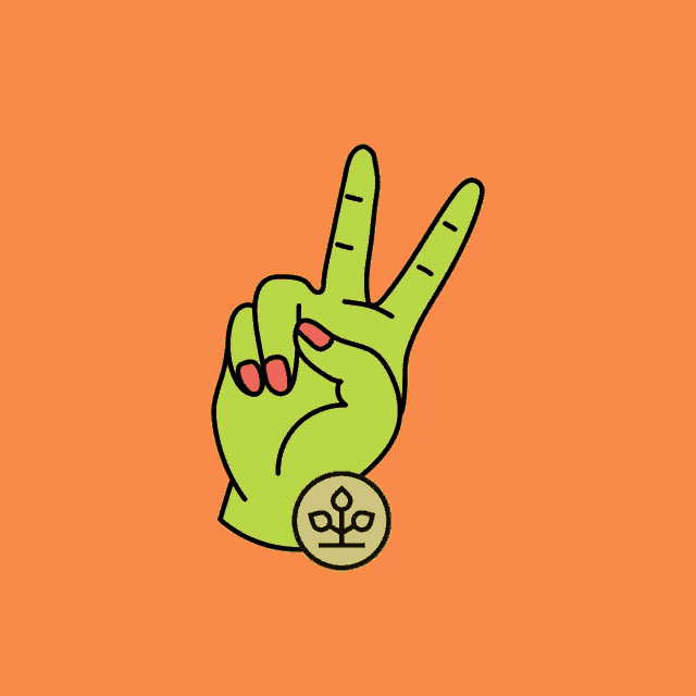 a green hand with red nails is giving the peace sign