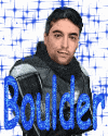a man in a jacket with the name boulder written in blue