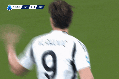 a soccer player wearing a white jersey with the number 10 on it