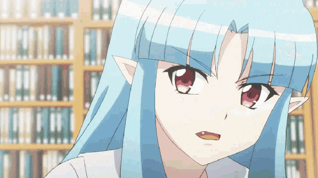 a blue haired anime character with red eyes and ears