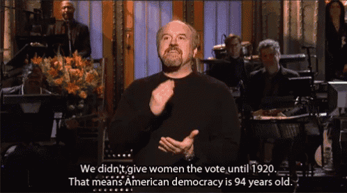 a man is giving a speech about american democracy